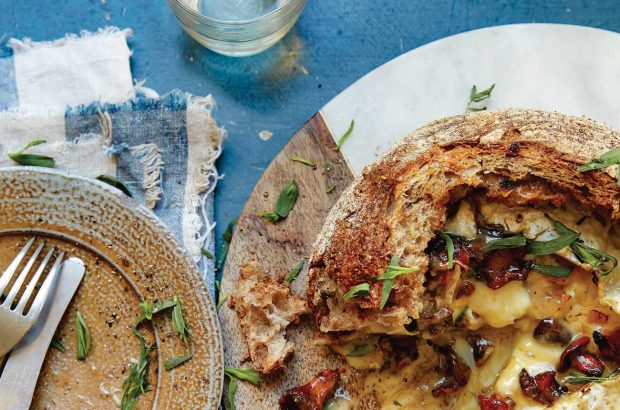Loaf-baked whole cheese with girolles